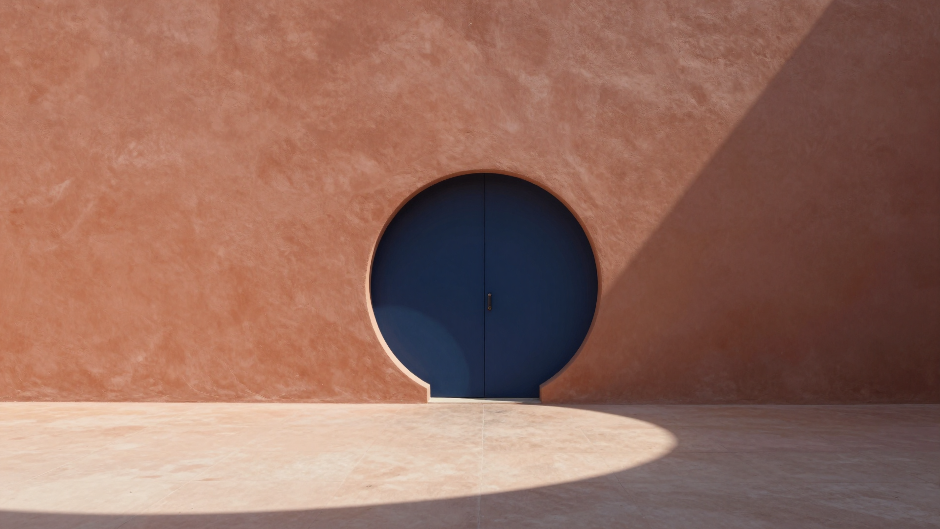 Minimalist Blue Circular Door in Warm Terracotta Architecture